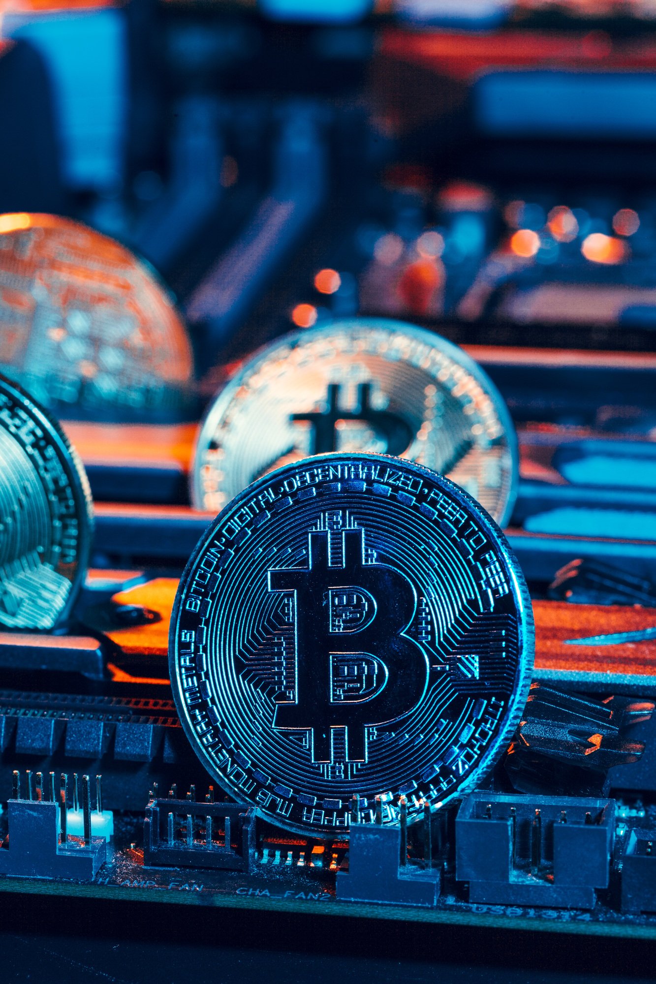 golden bitcoin and computer chip in background